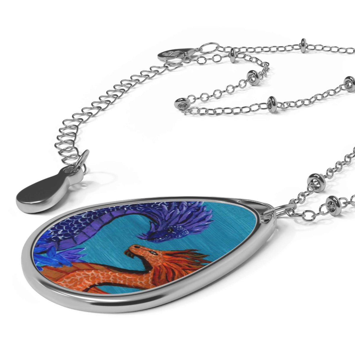 Dragon Heart Oval Necklace – Blue & Orange Fantasy Pendant - The Sleepy Easel